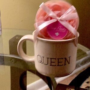 Coffee/ Tea cup - with the word QUEEN on it-never used- the Rose Petals